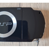 PSP 2004 zwart Complete Set  in nieuwstaat + autolader