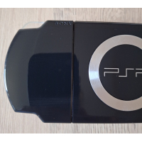 PSP 2004 zwart Complete Set  in nieuwstaat + autolader