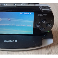 PSP 1004 zwart Complete Set  in nieuwstaat + docking