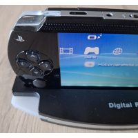 PSP 1004 zwart Complete Set  in nieuwstaat + docking