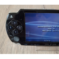 PSP 2004  zwart 10 games naar keuze op SD kaart