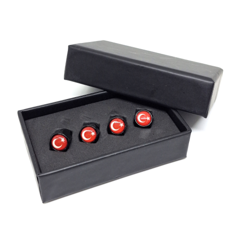 Ventieldopjes met de vlag van Turkije in cadeau-verpakking.