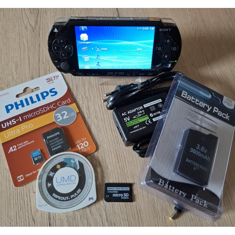PSP 1004  zwart zeer net + 10 games naar keuze op SD kaart